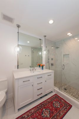 Bathroom, Dual Sink Vanities, Glass Shower, Interior, Marble Walls, Pendant Lights, Recessed Lighting