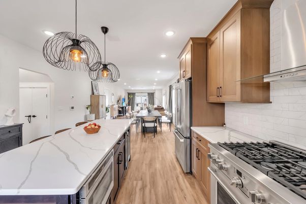 Chandelier, Dining room, Interior, Kitchen, Pendant Lights, Recessed Lighting, Stainless Steel Appliances, Wood Texture Flooring