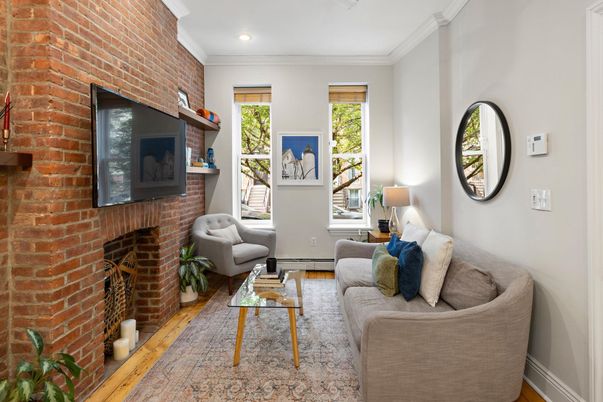 Fireplace, Interior, Living room, Recessed Lighting, Stone Walls, Wood Texture Flooring