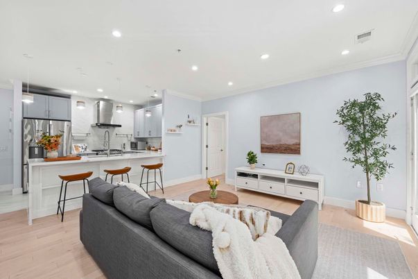 Interior, Kitchen, Living room, Marble Walls, Pendant Lights, Recessed Lighting, Stainless Steel Appliances, Wood Texture Flooring
