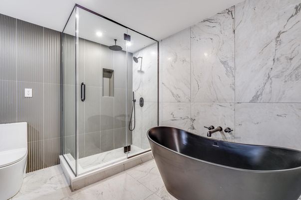 Bathroom, Free Standing Baths, Glass Shower, Interior, Marble, Marble Walls, Recessed Lighting