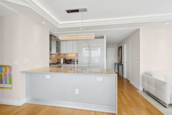 Chandelier, Interior, Kitchen, Pendant Lights, Recessed Lighting, Stainless Steel Appliances, Wood Texture Flooring