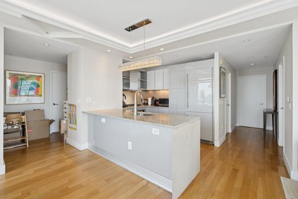Chandelier, Interior, Kitchen, Pendant Lights, Recessed Lighting, Stainless Steel Appliances, Wood Texture Flooring