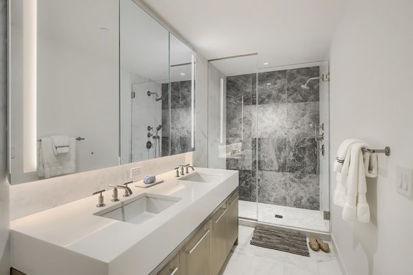 Bathroom, Dual Sink Vanities, Glass Shower, Interior, Marble, Marble Walls, Recessed Lighting