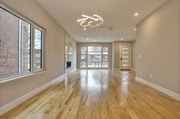 Empty room, Fireplace, Interior, Pendant Lights, Recessed Lighting, Wood Texture Flooring