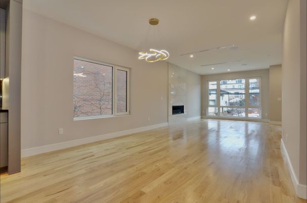Empty room, Fireplace, Interior, Pendant Lights, Recessed Lighting, Wood Texture Flooring