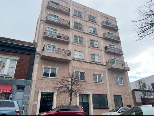 Exterior, Facade, Brick Facade, Condo Building