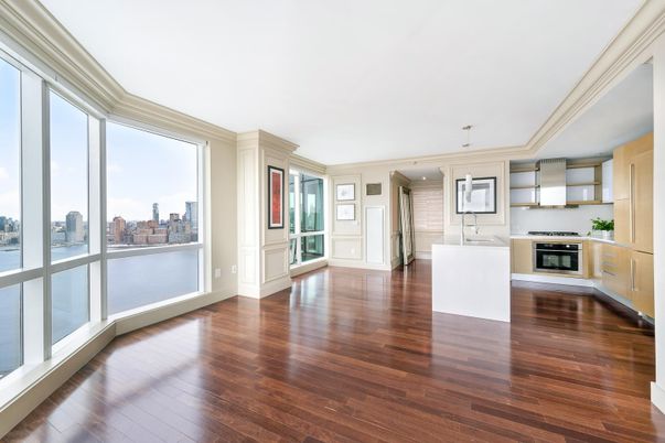 Empty room, Interior, Kitchen, Recessed Lighting, Stainless Steel Appliances, Water, Wood Texture Flooring