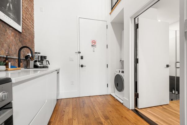 Interior, Kitchen, Stone Walls, Washer, Wood Texture Flooring