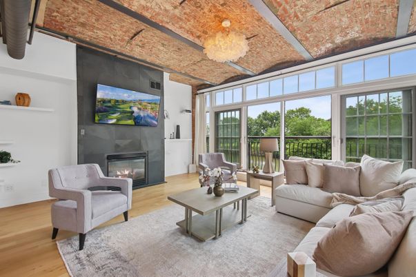 Chandelier, Fireplace, Interior, Living room, Sun Room, Wood Texture Flooring