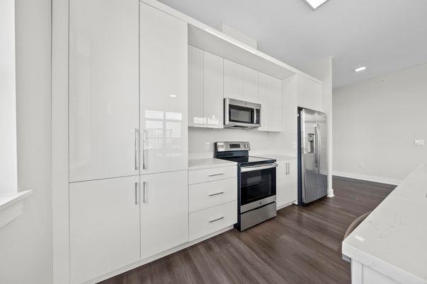 Interior, Kitchen, Recessed Lighting, Stainless Steel Appliances, Wood Texture Flooring