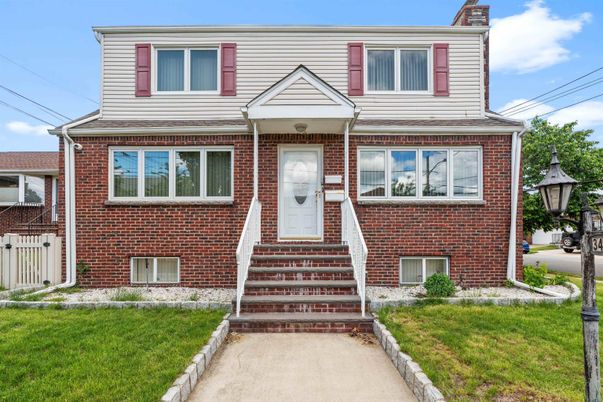 Exterior, Facade, Brick Facade, Raised Ranch
