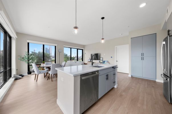 Dining room, Interior, Kitchen, Living room, Pendant Lights, Recessed Lighting, Stainless Steel Appliances, Wood Texture Flooring