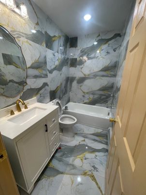 Bathroom, Dual Sink Vanities, Interior, Marble, Marble Walls, Recessed Lighting
