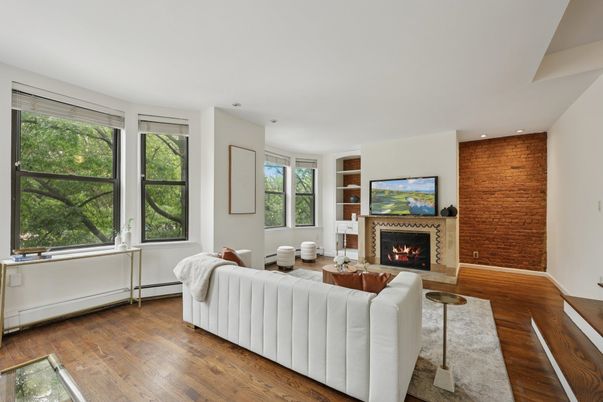 Fireplace, Interior, Living room, Recessed Lighting, Stone Walls, Wood Texture Flooring