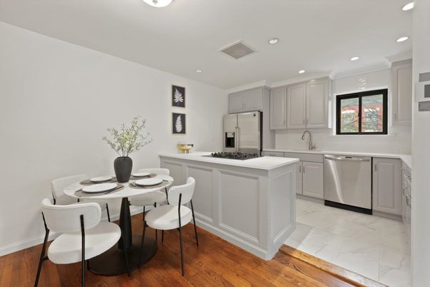 Dining room, Interior, Kitchen, Marble, Recessed Lighting, Stainless Steel Appliances, Wood Texture Flooring