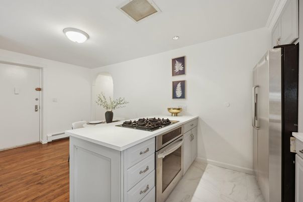 Interior, Kitchen, Marble, Recessed Lighting, Stainless Steel Appliances, Wood Texture Flooring