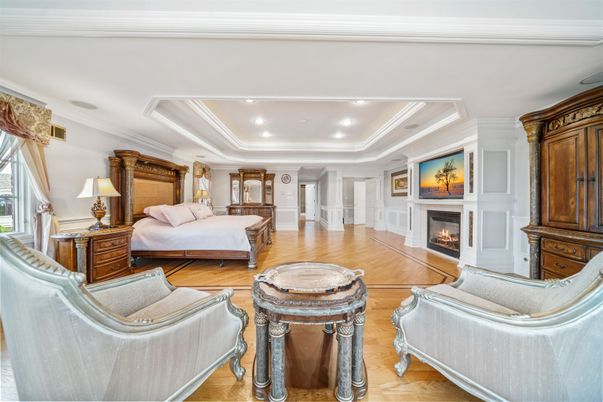 Bedroom, Fireplace, Interior, Living room, Recessed Lighting, Wood Texture Flooring