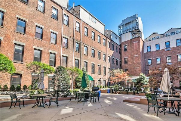 Exterior, Facade, Brick Facade, Condo Building