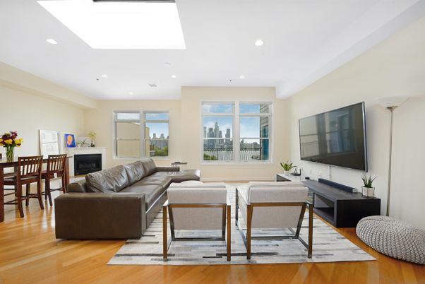 Dining room, Fireplace, Interior, Living room, Recessed Lighting, Wood Texture Flooring