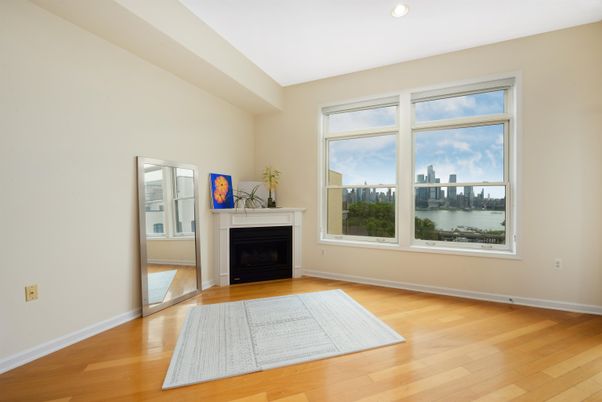 Empty room, Fireplace, Interior, Recessed Lighting, Water, Wood Texture Flooring