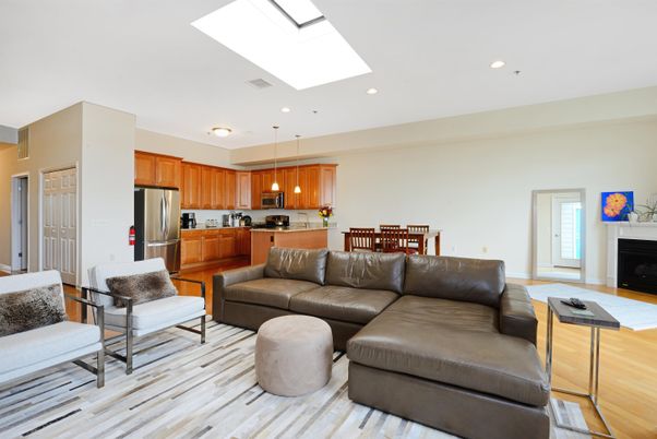 Dining room, Fireplace, Interior, Kitchen, Living room, Pendant Lights, Recessed Lighting, Stainless Steel Appliances, Wood Texture Flooring