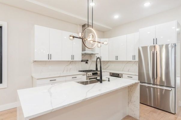 Interior, Kitchen, Marble Walls, Pendant Lights, Recessed Lighting, Stainless Steel Appliances, Wood Texture Flooring