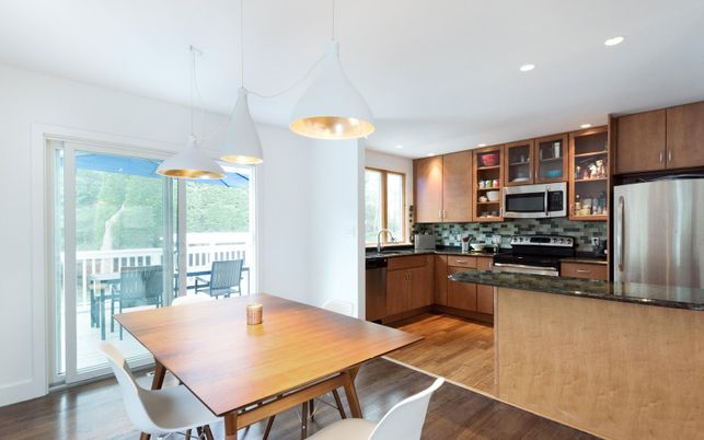 Dining room, Interior, Kitchen, Pendant Lights, Recessed Lighting, Stainless Steel Appliances, Wood Texture Flooring