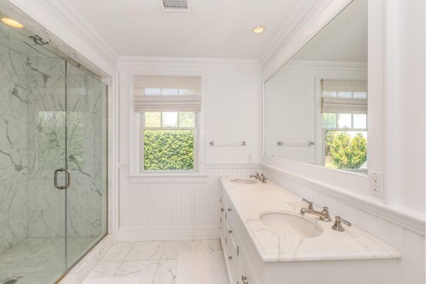 Bathroom, Dual Sink Vanities, Glass Shower, Interior, Marble, Marble Walls, Recessed Lighting