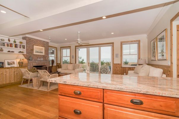 Fireplace, Interior, Living room, Recessed Lighting, Stone Walls, Wood Texture Flooring
