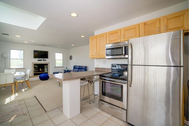 Dining room, Fireplace, Interior, Kitchen, Living room, Recessed Lighting, Stainless Steel Appliances