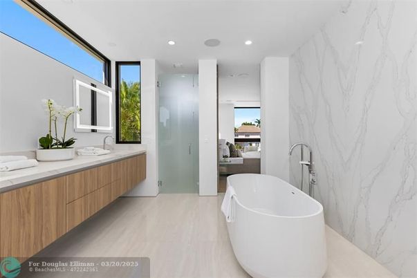 Bathroom, Dual Sink Vanities, Free Standing Baths, Glass Shower, Interior, Marble, Marble Walls, Recessed Lighting