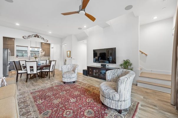 Dining room, Interior, Kitchen, Living room, Recessed Lighting, Stainless Steel Appliances, Wood Texture Flooring
