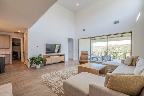 Interior, Kitchen, Living room, Recessed Lighting, Washer, Wood Texture Flooring