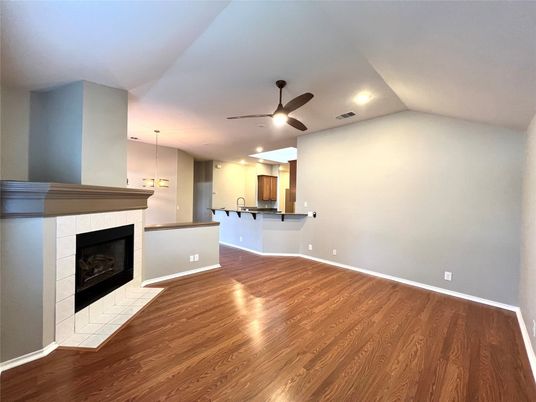 Empty room, Fireplace, Interior, Pendant Lights, Recessed Lighting, Wood Texture Flooring