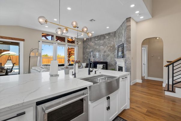 Fireplace, Interior, Kitchen, Pendant Lights, Recessed Lighting, Stainless Steel Appliances, Wood Texture Flooring