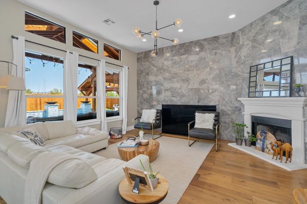 Fireplace, Interior, Living room, Pendant Lights, Recessed Lighting, Stone Walls, Wood Texture Flooring