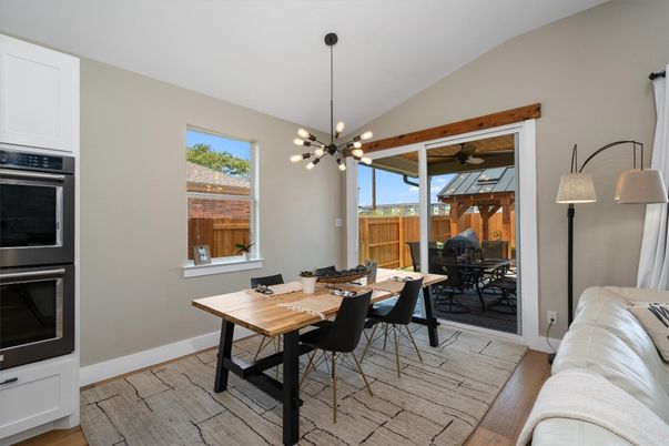 Dining room, Interior, Kitchen, Pendant Lights, Stainless Steel Appliances, Wood Texture Flooring