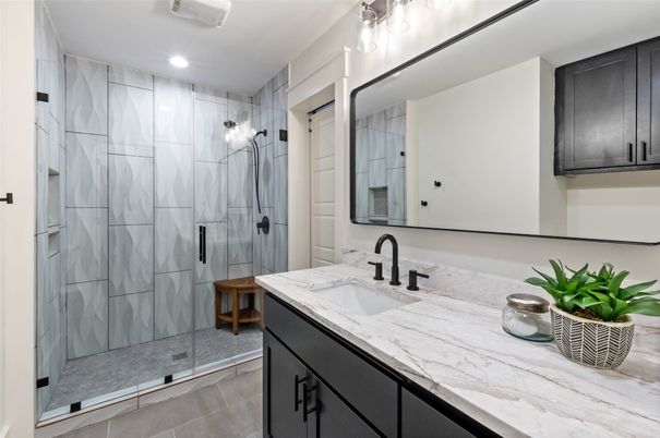 Bathroom, Dual Sink Vanities, Glass Shower, Interior, Marble Walls, Recessed Lighting