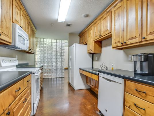 Interior, Kitchen, Recessed Lighting, Washer, Wood Texture Flooring