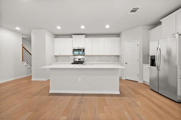 Interior, Kitchen, Recessed Lighting, Stainless Steel Appliances, Wood Texture Flooring