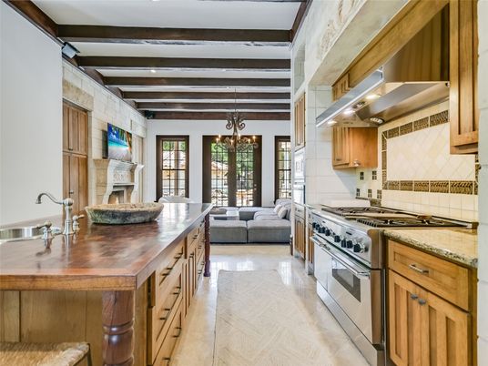 Chandelier, Fireplace, Interior, Kitchen, Stainless Steel Appliances, Wooden Beams