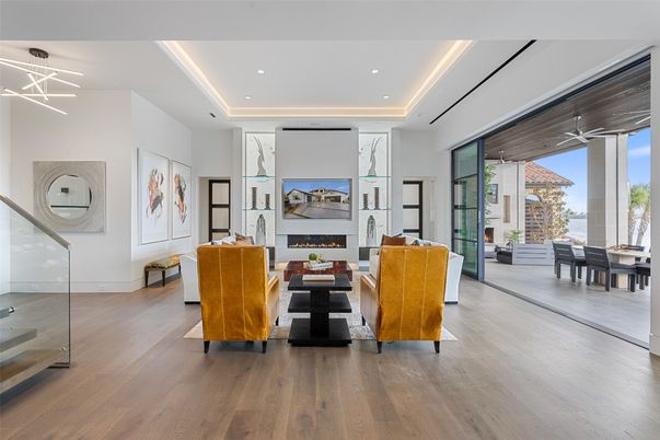 Dining room, Fireplace, Interior, Living room, Pendant Lights, Recessed Lighting, Wood Texture Flooring