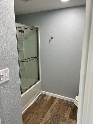 Bathroom, Glass Shower, Interior, Recessed Lighting, Wood Texture Flooring