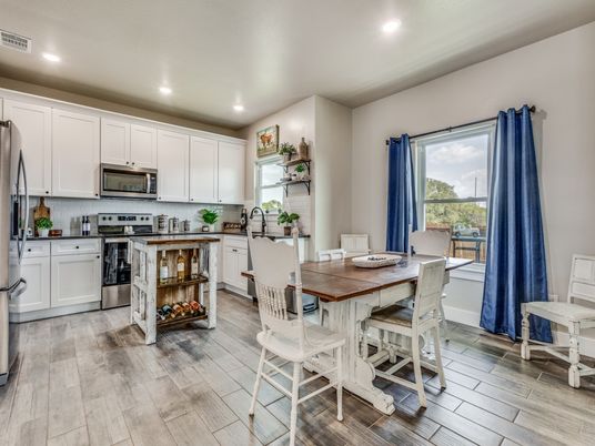 Dining room, Interior, Kitchen, Recessed Lighting, Stainless Steel Appliances, Wood Texture Flooring