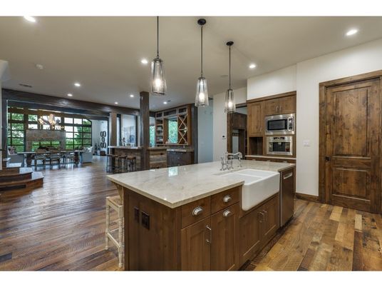 Dining room, Interior, Kitchen, Pendant Lights, Recessed Lighting, Stainless Steel Appliances, Wood Texture Flooring
