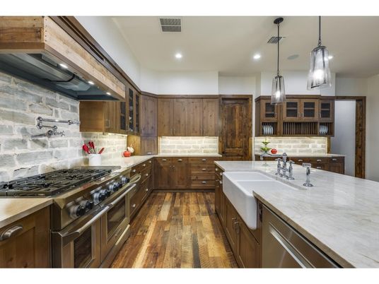 Interior, Kitchen, Pendant Lights, Recessed Lighting, Stainless Steel Appliances, Stone Walls, Wood Texture Flooring