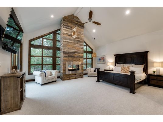 Bedroom, Fireplace, Interior, Pendant Lights, Recessed Lighting, Stone Walls