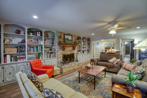Fireplace, Interior, Living room, Recessed Lighting, Stone Walls, Wood Texture Flooring
