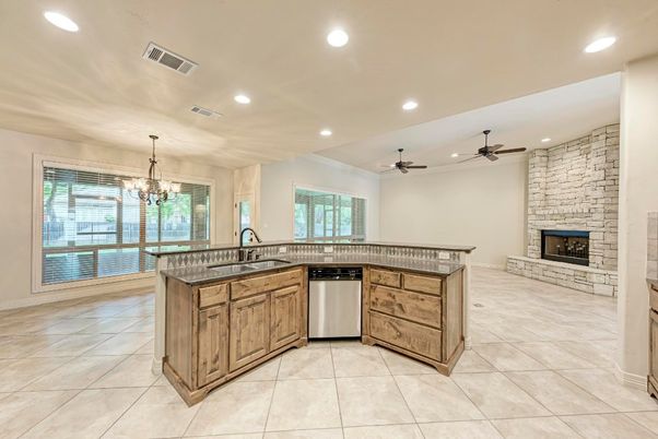 Chandelier, Fireplace, Interior, Kitchen, Pendant Lights, Recessed Lighting, Stone Walls